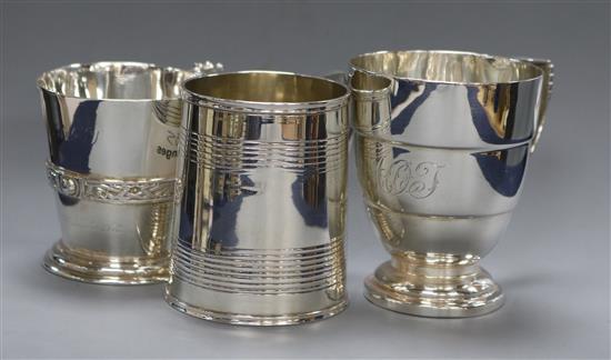 A Victorian silver christening mug, London 1871 and two others including Art Deco by Mappin & Webb, 11.5 oz.